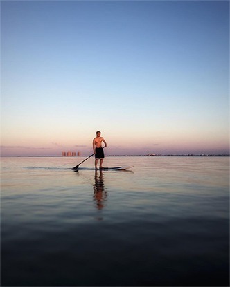 Paddle boarding in Navarre Beach