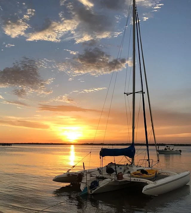 Boat on water during sunset