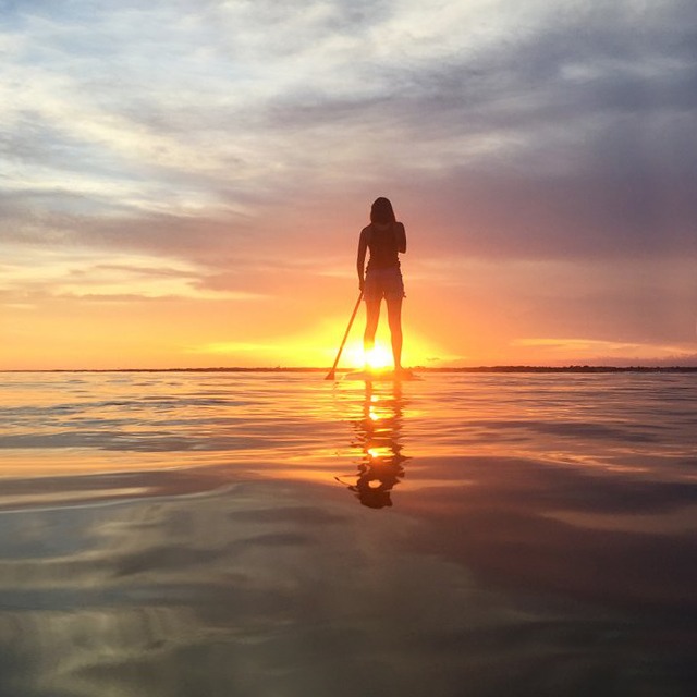 Sunset paddle boarding